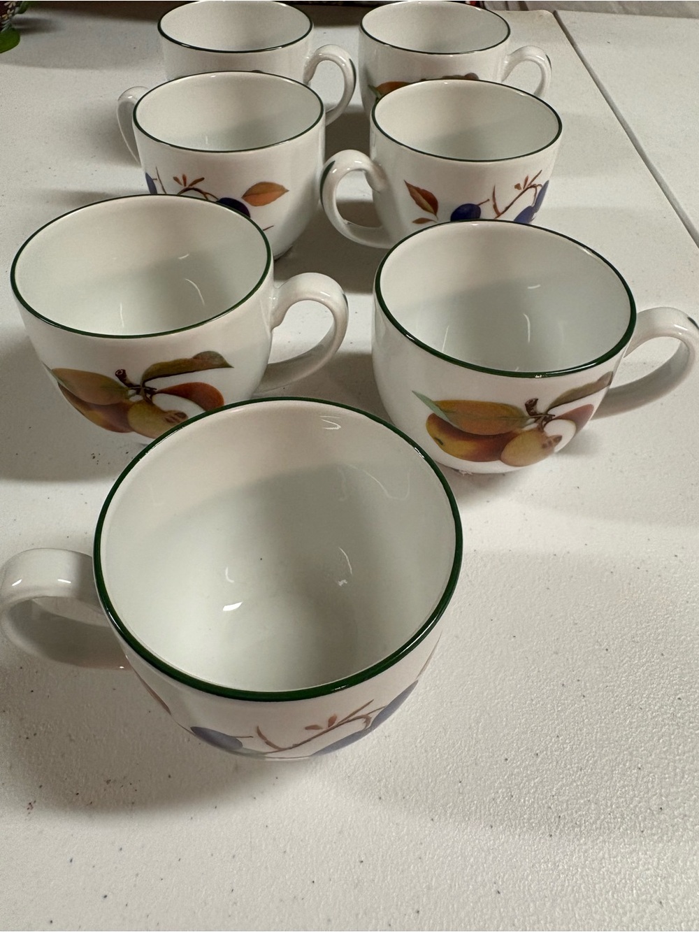 White Ceramic Fruit Mugs with Green Rim - Set of 7